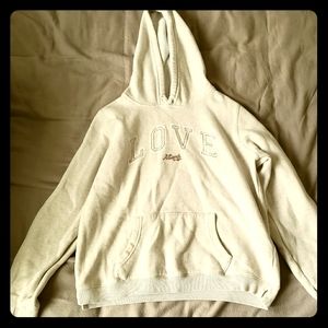 American eagle cream colored hooded sweatshirt
